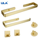 Conjunto de ferragens para banheiro dourado.